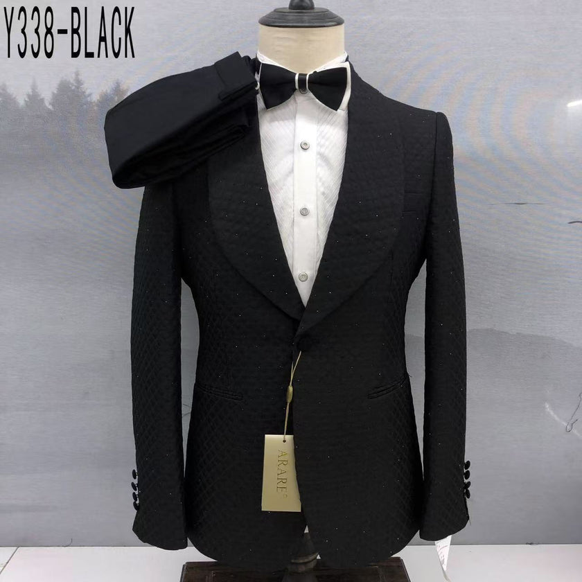 Black tuxedo jacket with shawl lapels and subtle sparkle texture, front button closure