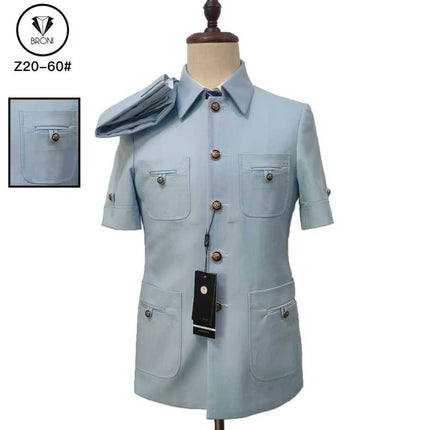 Light blue short-sleeve safari suit with flap pockets and button front